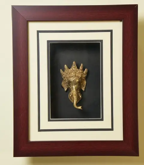 The Ganesha Head Dokra Brass Framed Artwork